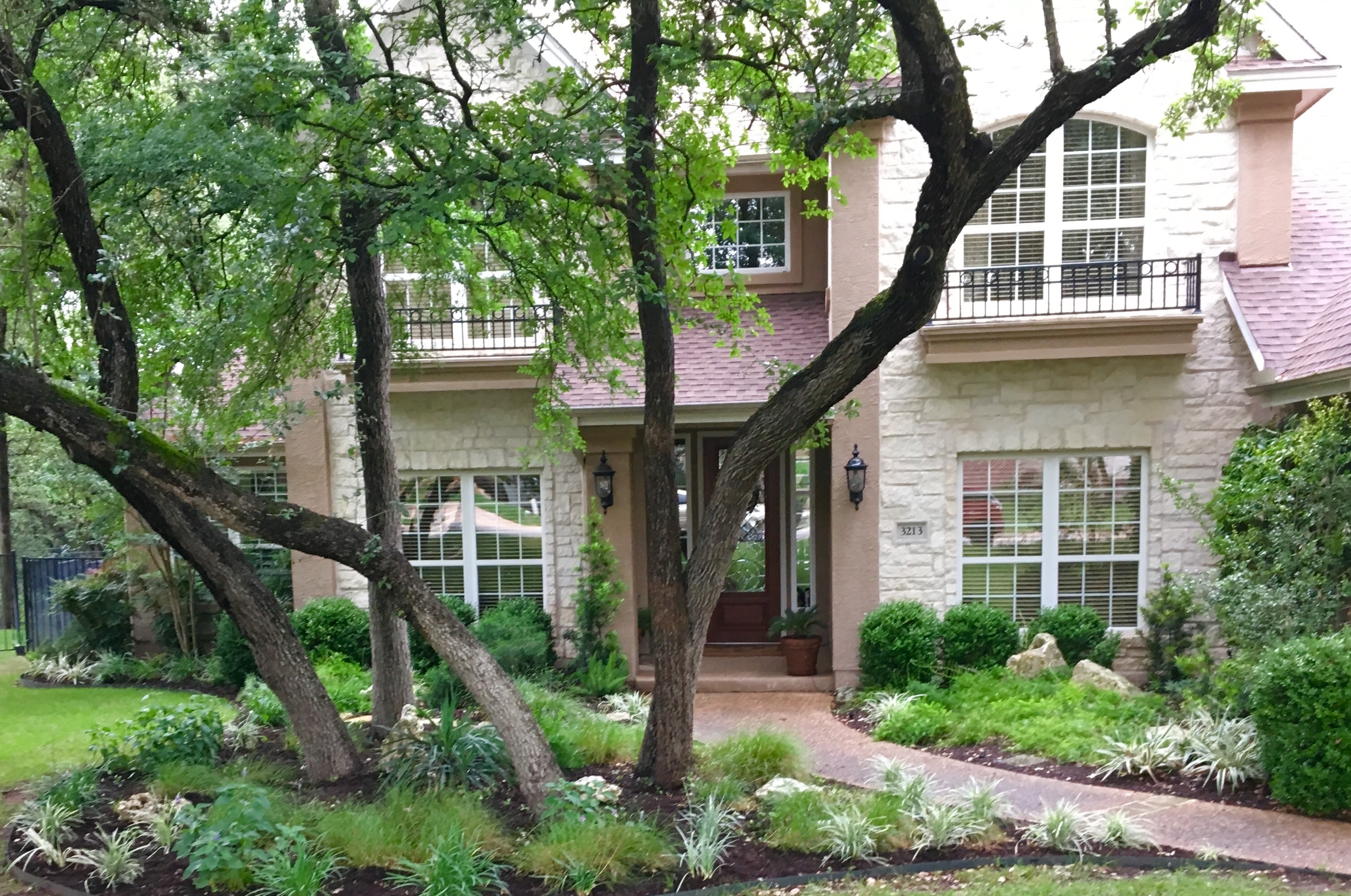 Residential property with mature trees and landscaping
